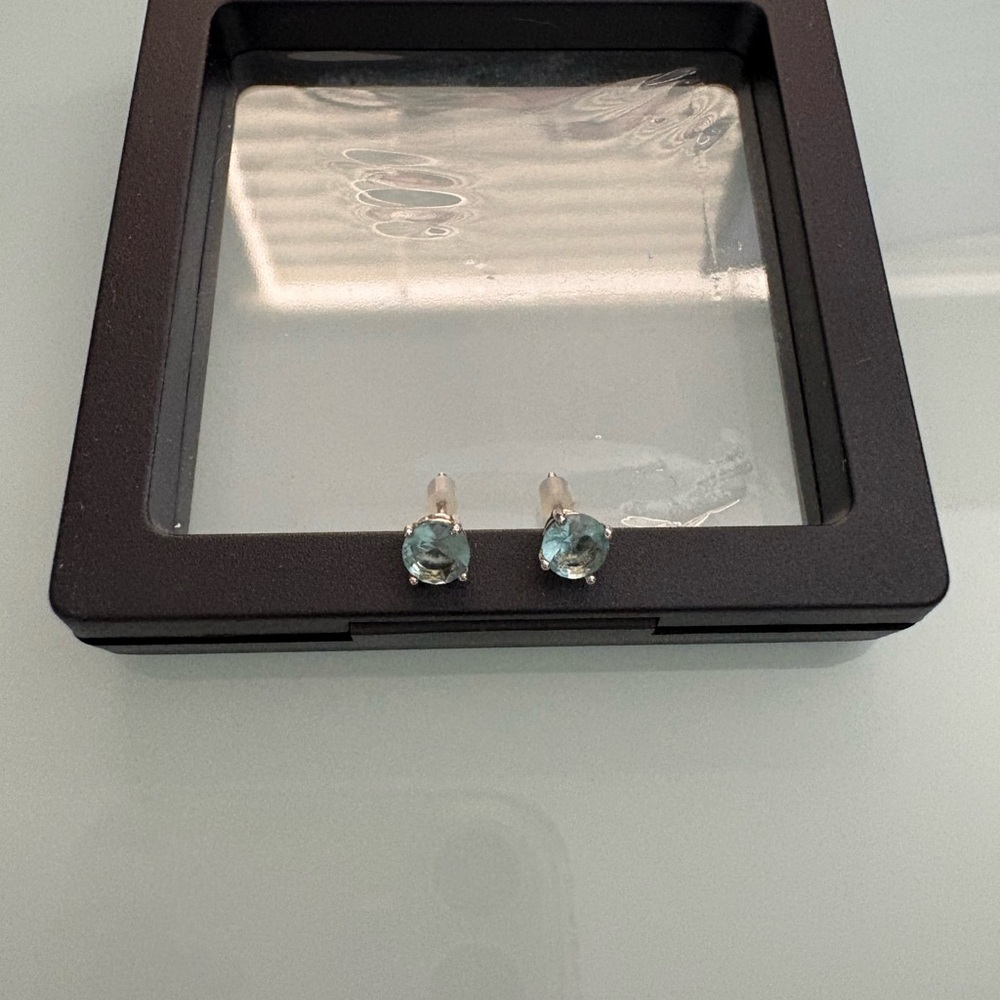 Sterling Silver Blue Topaz Stud Earrings